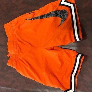 Boys medium Nike orange shorts